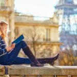 a student researching J1 visa health insurance requirements for studying in the U.S.