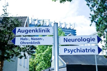 Hospital sign:  Directions to Psychiatry, Neurology, and Eye, Otolaryngology (Nose/throat/Ear) Departments (in German language) best hospitals in germany