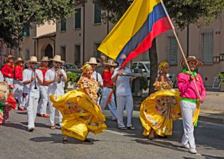 Street parade of Colombian Dancers Abroad Group of people celebrating the pride month on a pride event